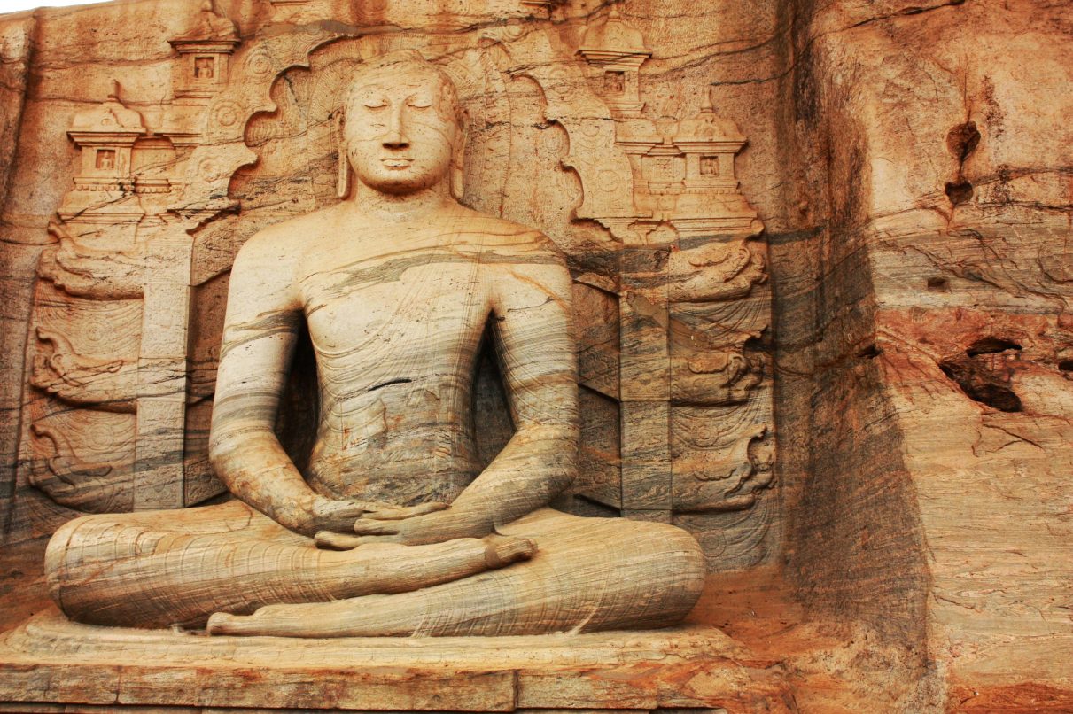 Figure of Buddha carved from stone.