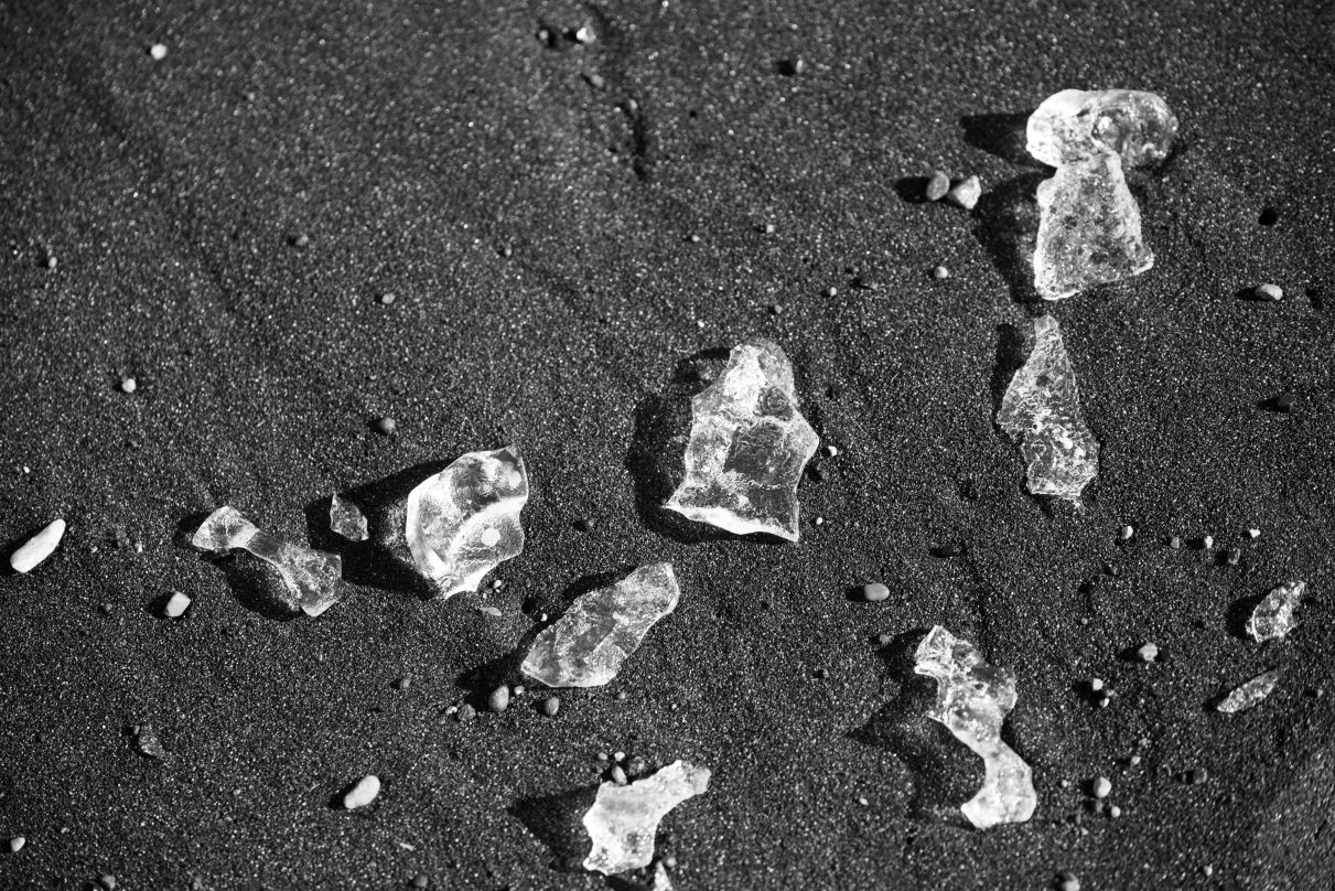 several diamonds lying on rough ground